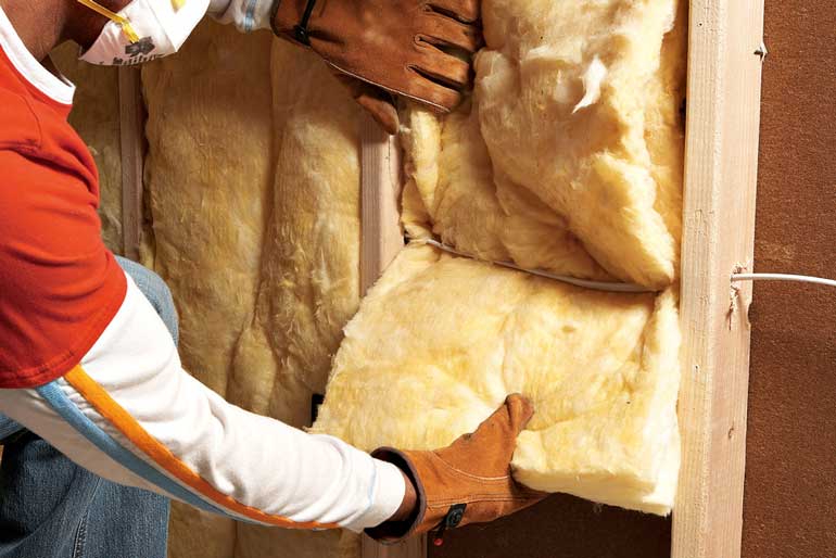 Don't tuck full-thickness batts behind any pipes