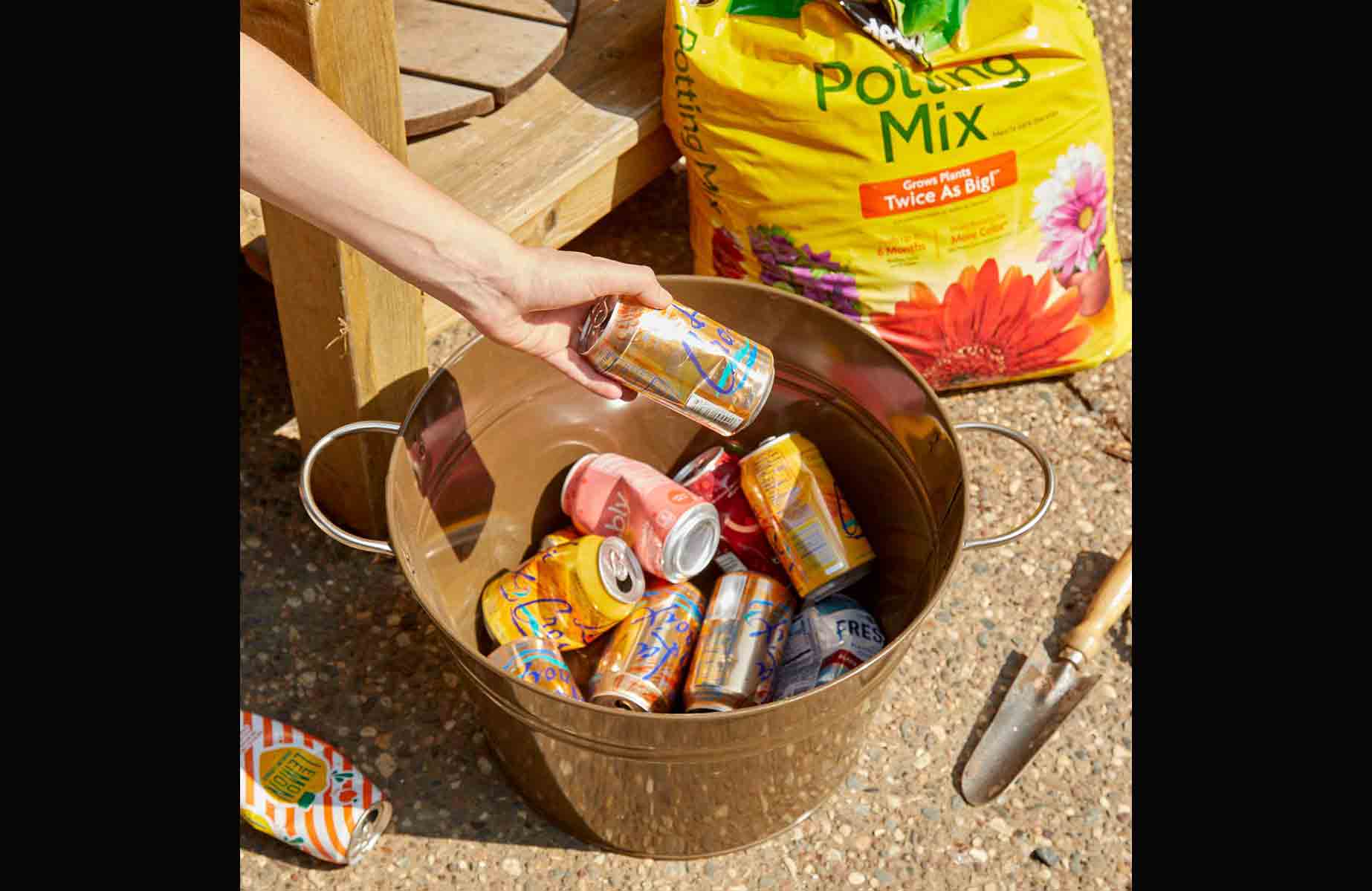 Saving soil with old cans