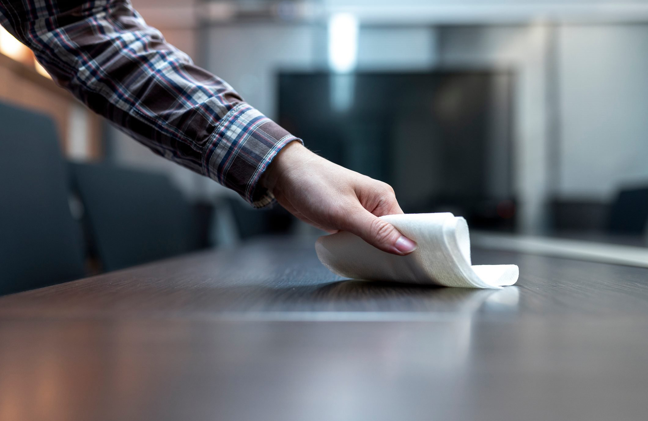 Dusting surfaces with a dry rag