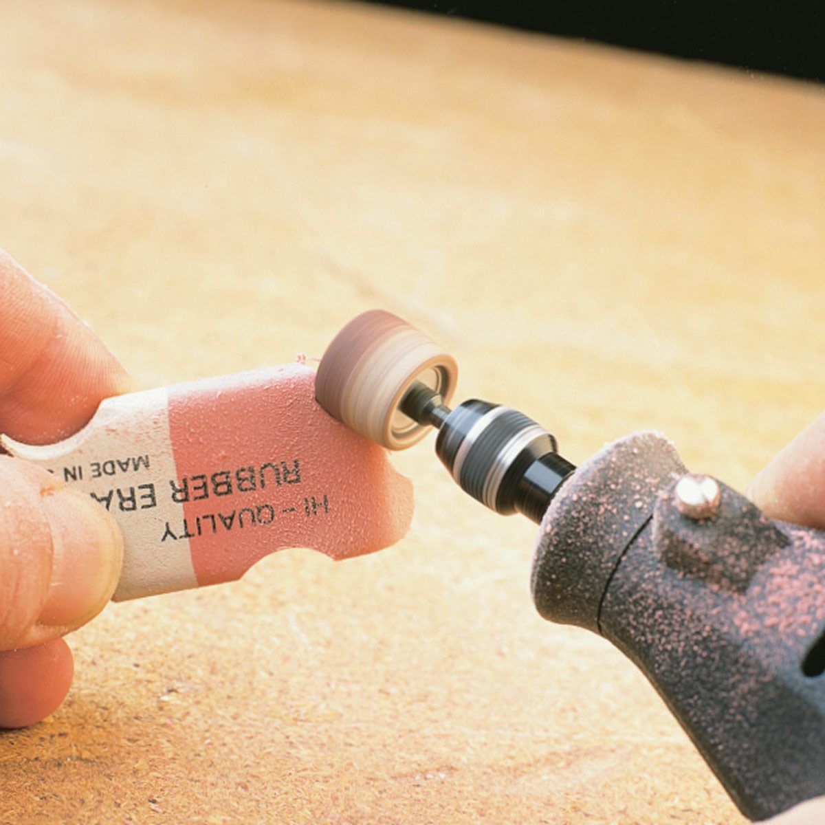 Clean a mini sanding drum with an eraser