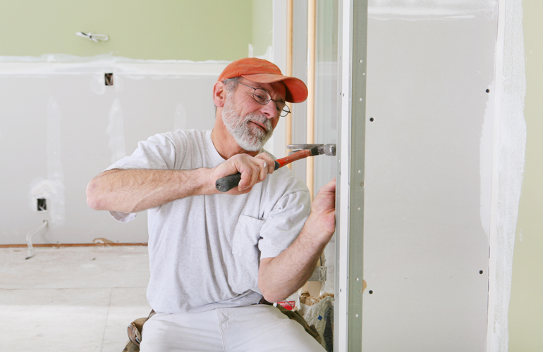 How to hang plasterboard: pro tips for cutting and installing