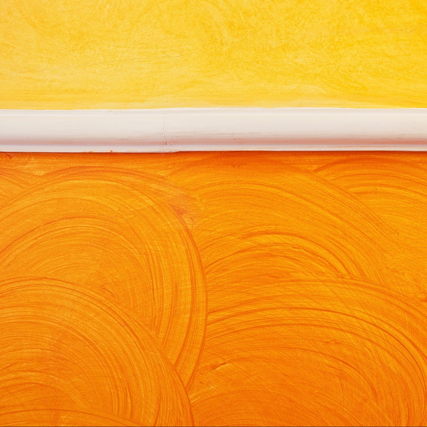 Use a sponge to paint a wall