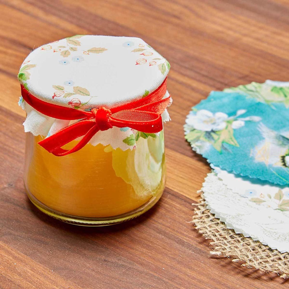For gifts, cover your DIY beeswax candles with a cloth top