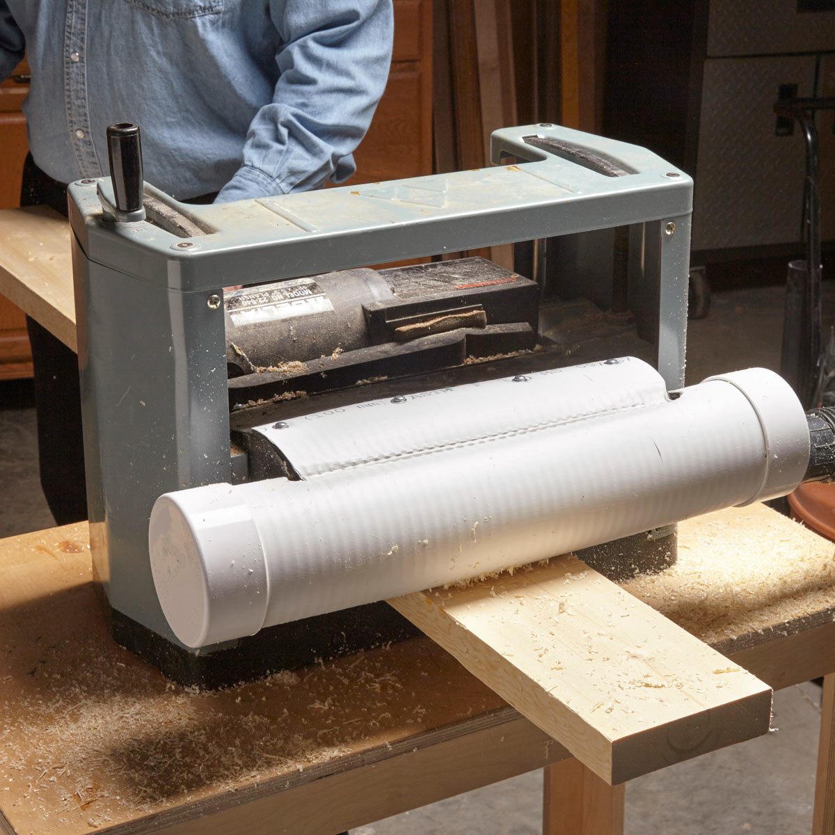 Catch wood chips with PVC pipe