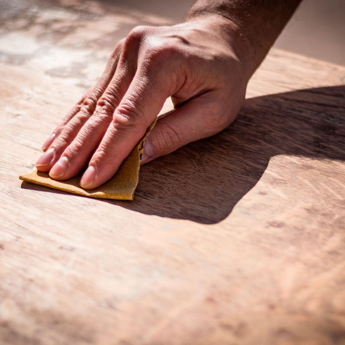 Step 6: Distress the cabinet (if desired)